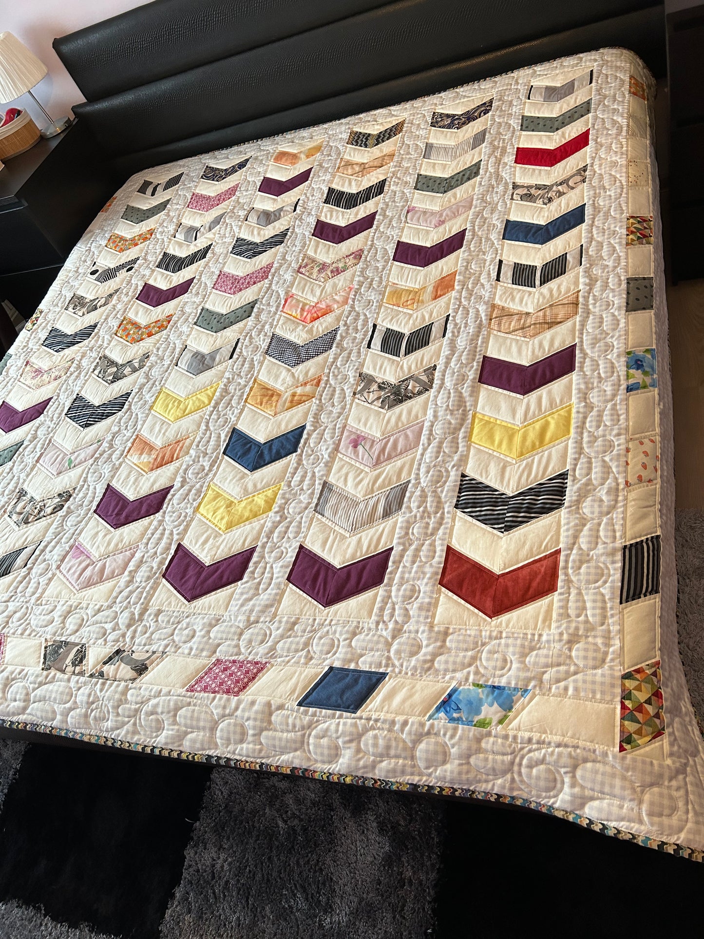 Quilted queen size blanket with embroidery details