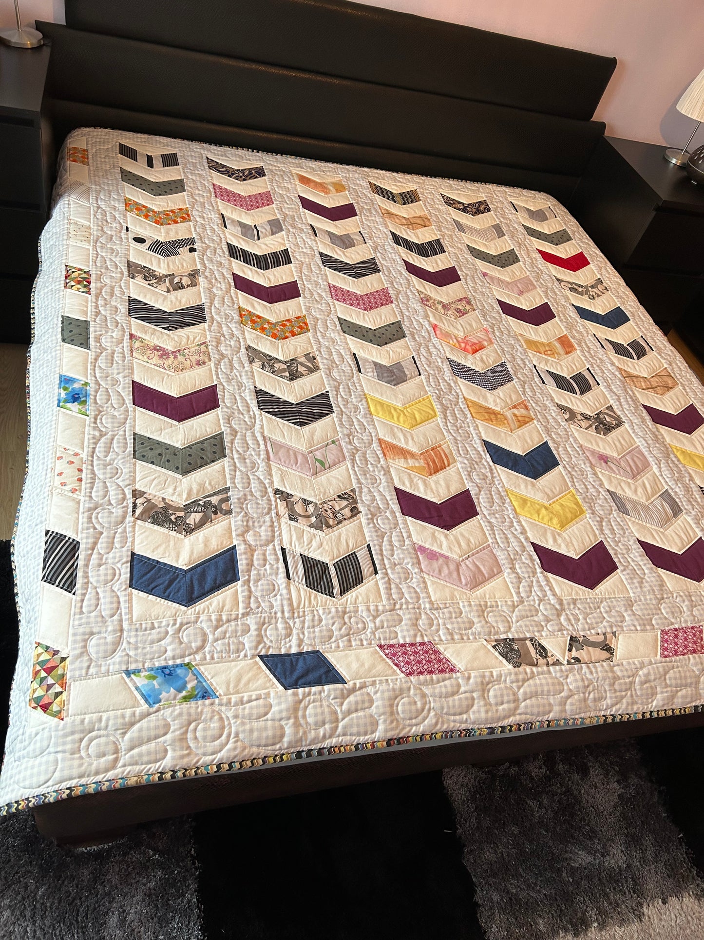 Quilted queen size blanket with embroidery details