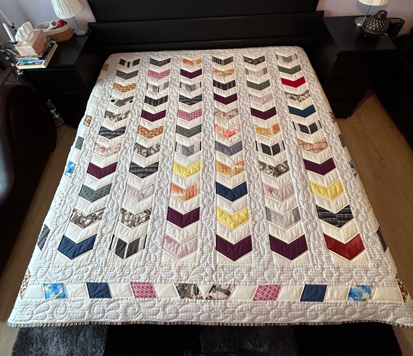 Quilted queen size blanket with embroidery details